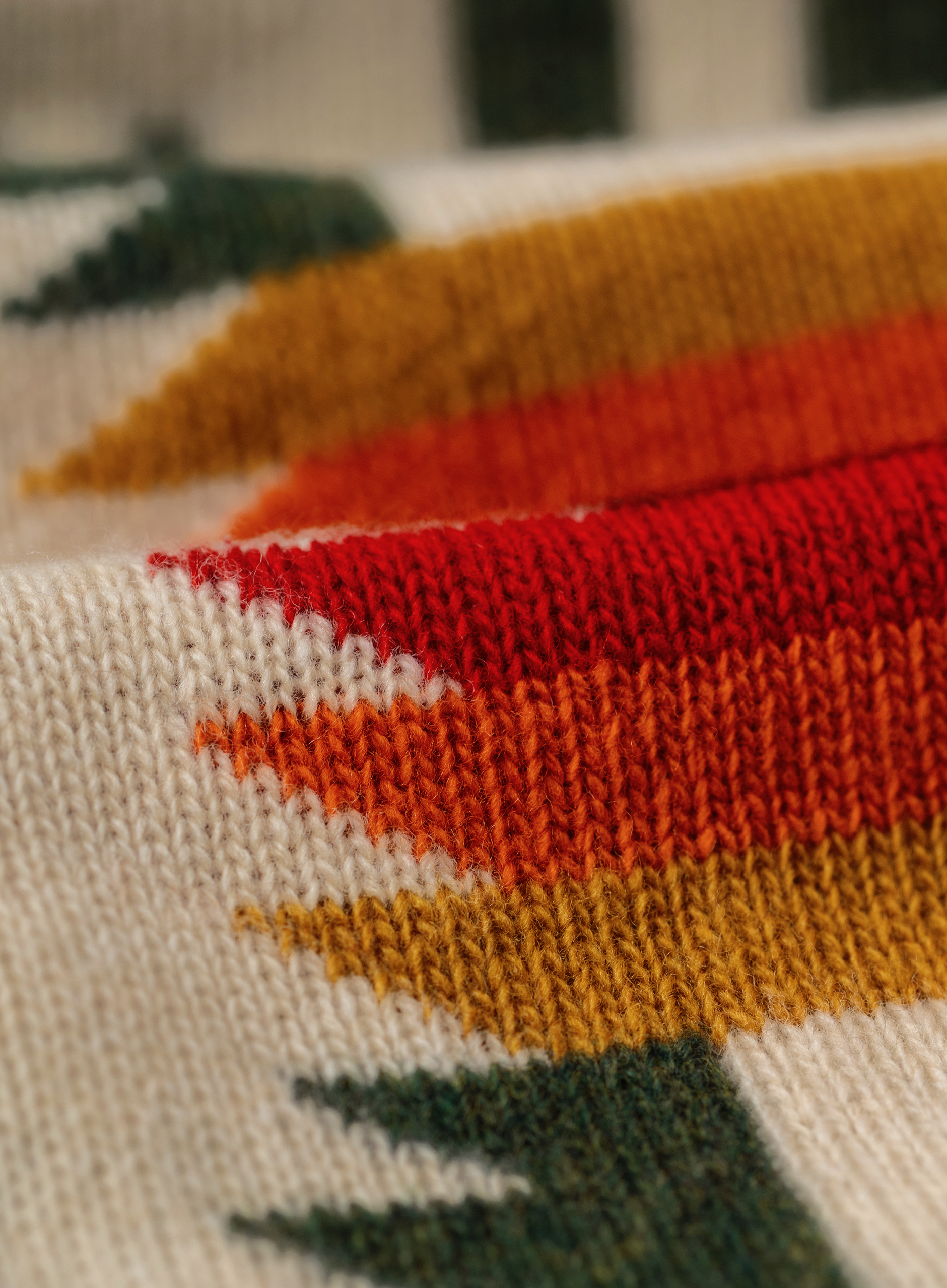 Knoopvest van scheerwol met jacquarddessin | FULL_WIDTH | Groen