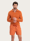 Badstof poloshirt met lange mouwen van katoen | MODEL | FULL_WIDTH | Roest 