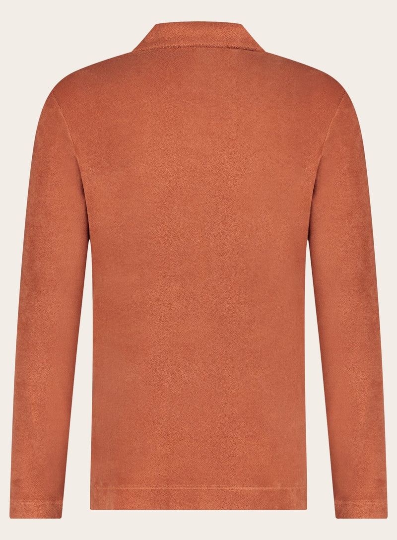 Polo shirt with long sleeves in terry cloth